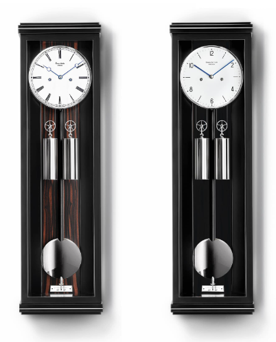 ERWIN SATTLER CLASSICA S 70 M.
Zwart gelakte kast met metaal inleg. Of zwart gelakte kast met Makasar  achterwand. Hoogte 70 cm 20,5 cm breed en 10,5 cm diep uitgevoerd met ontspiegeld mineraal glas. Uurwerk Sattler Kaliber 1400-4. Loopduur 7 dagen.
Slagwerk op de hele en de halve uren met repetitie. Wijzerplaat rand en slinger lens massief. Uurwerk voorzien van 4 Precisie kogellagers en 15 Robijn lagers. staal geblauwde wijzers. half uur slagwerk met repetitie op rondgong.